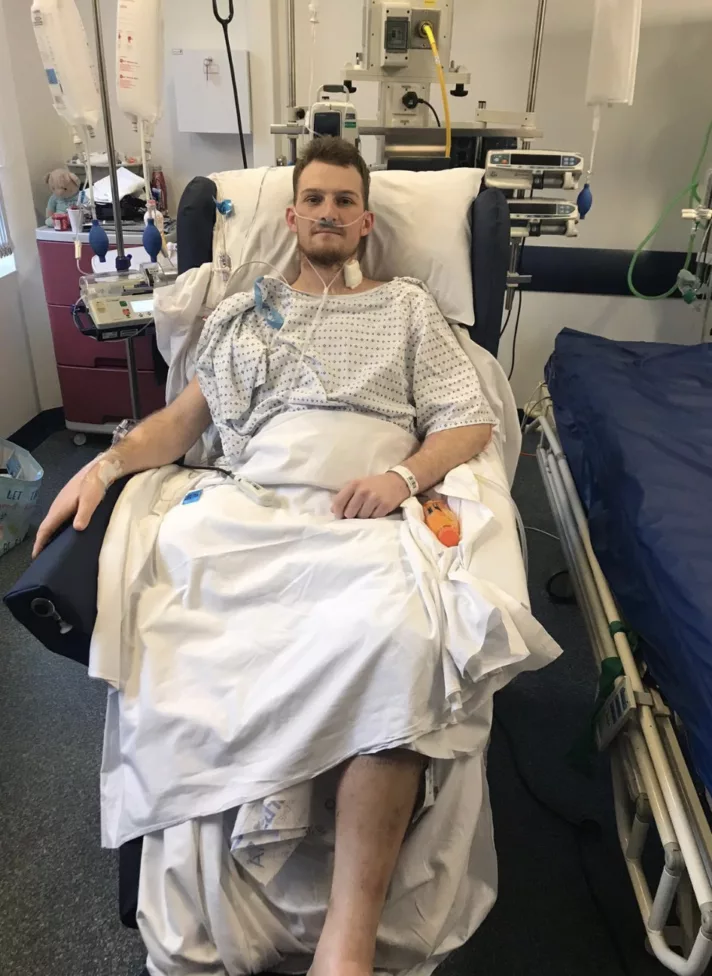 a man in a hospital bed