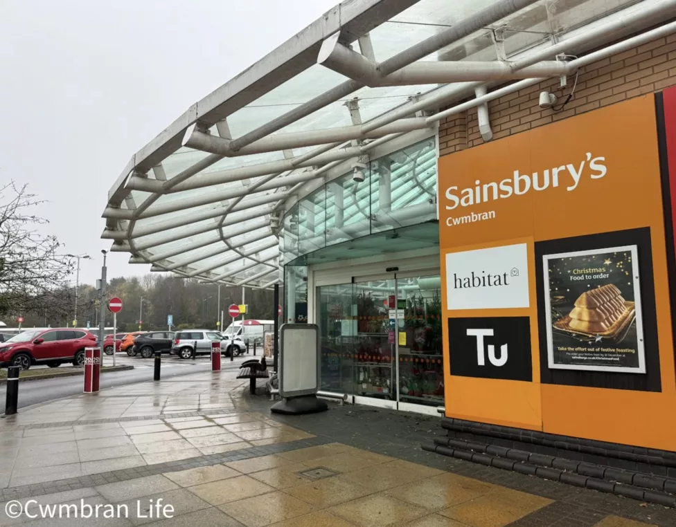 the outside of a sainsbury's supermarket by the car park