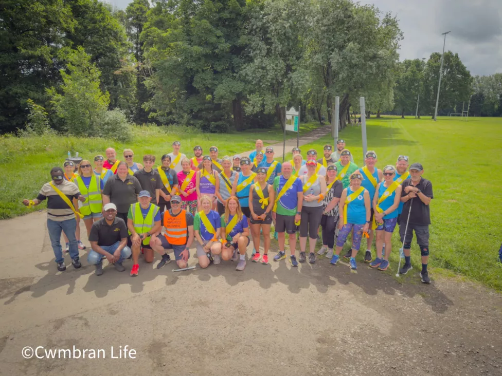 a group of men and women ready to start running