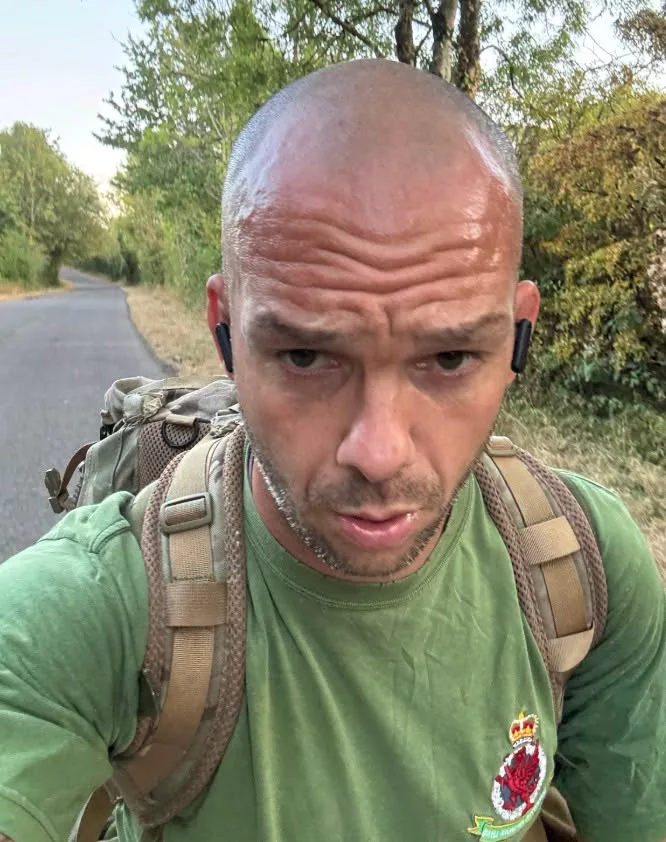 a man running wearing a rucksack