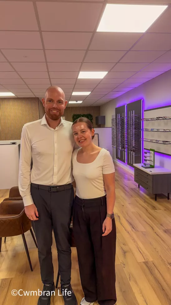 a man and woman in a an opticians