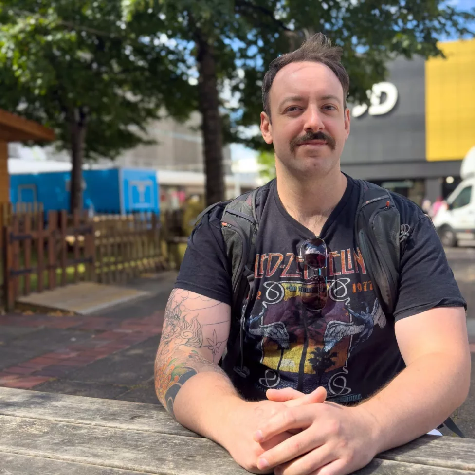 a man sat on a bench