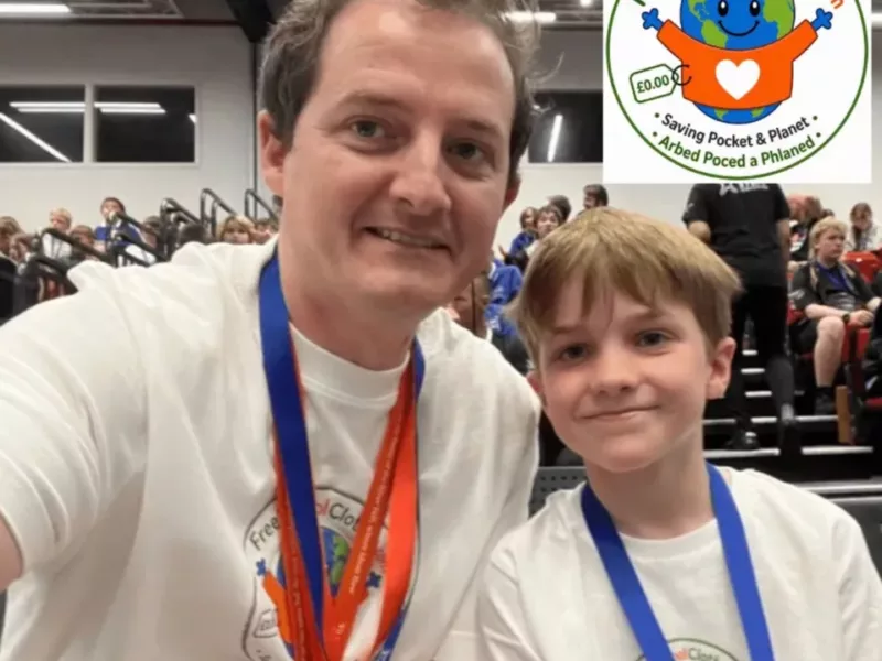 a dad and his son take a selfie