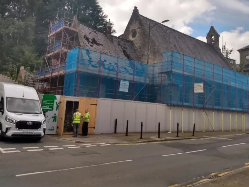 a church with scaffolding on it